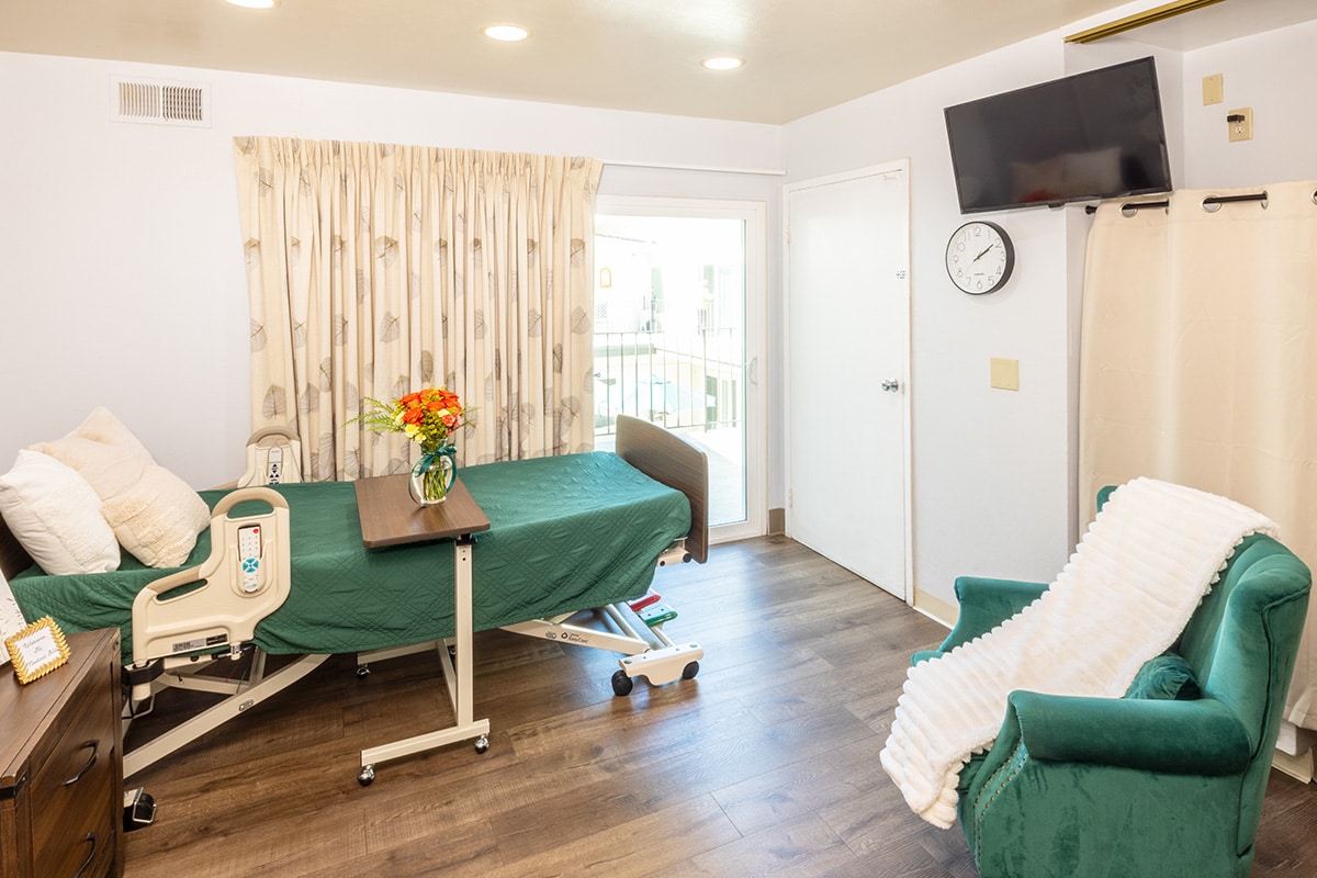 A patients room at Medical Hill with a TV and window